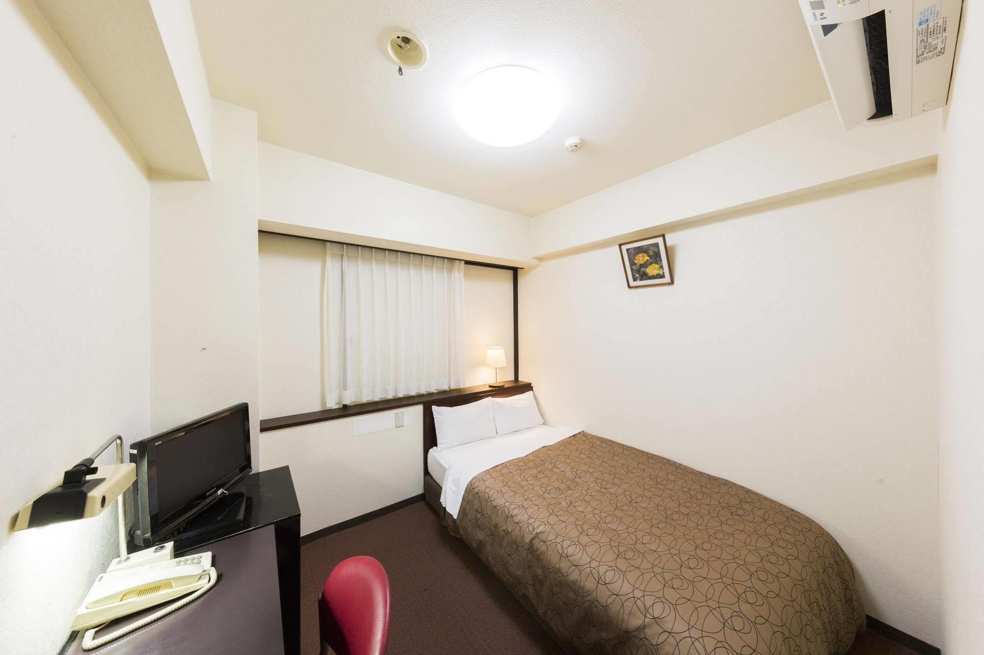 Dai-Ni Sunny Stone Hotel Suita Exterior foto